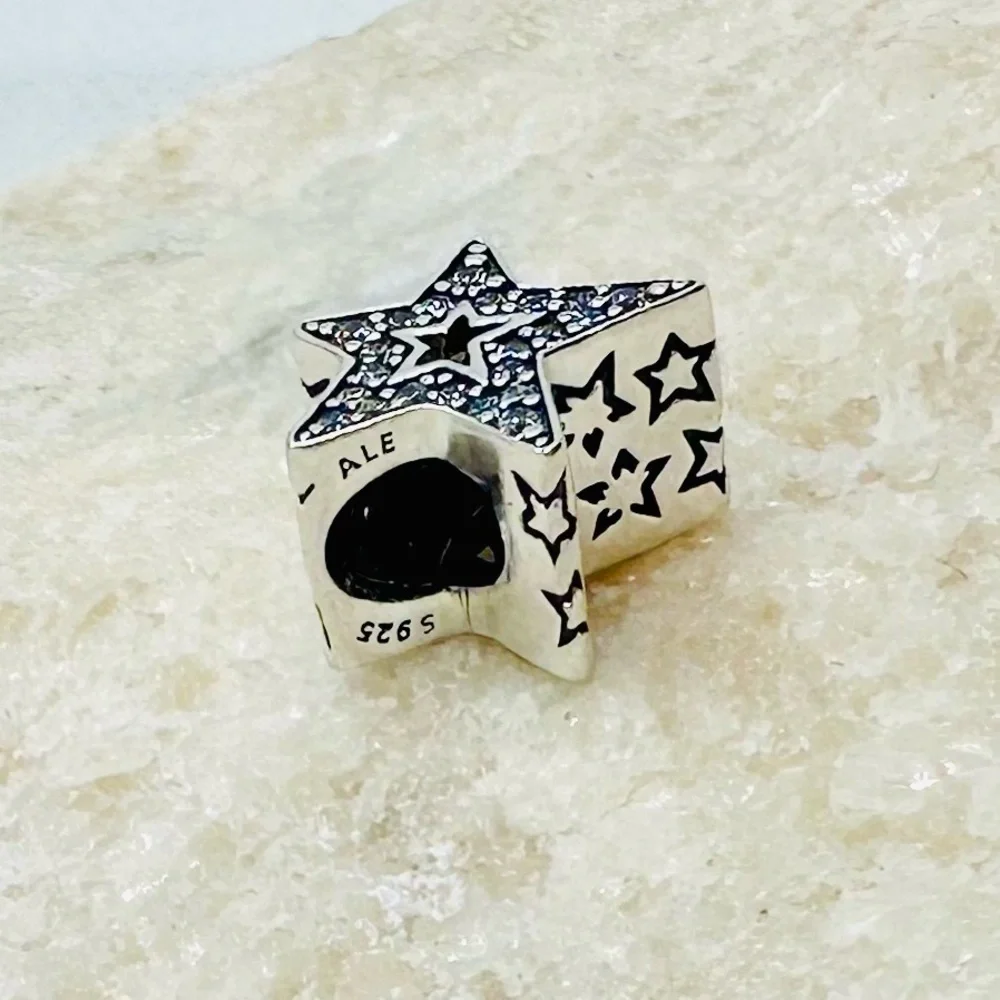 EUC Pandora 790016C01 Sterling Silver Asymmetric Star Charm w/ Clear CZ’s